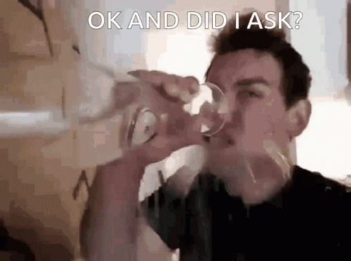 A Man Is Drinking From A Glass With The Words Ok And Did I Ask Written Above Him GIF