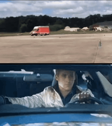 A Man Is Driving A Car And A Red Van Is Driving Behind Him GIF