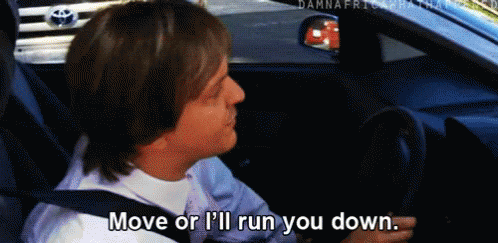 A Man Is Driving A Car And Says " Move Or I 'Ll Run You Down " GIF