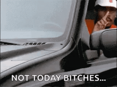 A Man Is Driving A Car With The Words Not Today Bitches Written On The Side GIF