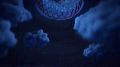 A Man Is Floating In The Air With A Cake In His Head GIF