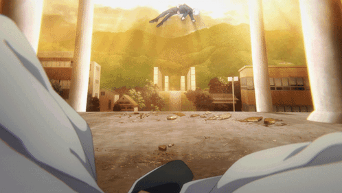 A Man Is Flying Through The Air In Front Of A Building With A Mountain In The Background GIF
