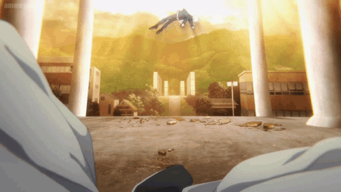 A Man Is Flying Through The Air In Front Of A Building With A Sunset In The Background GIF