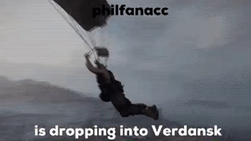 a man is flying through the air with a parachute and the words `` philfanacc is dropping into verdansk '' .