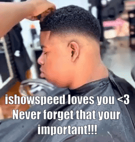 A Man Is Getting His Hair Cut By A Barber In A Barbershop . GIF