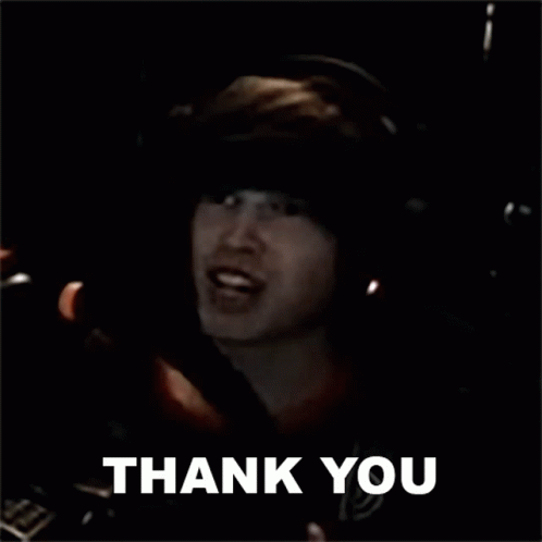 A Man Is Giving A Thumbs Up And The Words Thank You Are Above Him . GIF
