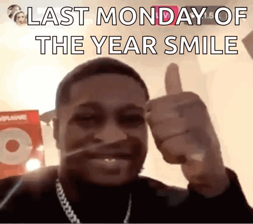 A Man Is Giving A Thumbs Up With The Words Last Monday Of The Year Smile Below Him GIF