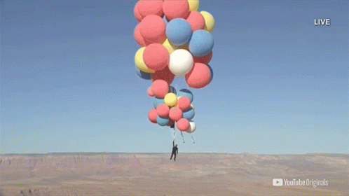 A Man Is Hanging From A Bunch Of Balloons With A Youtube Originals Logo In The Corner GIF