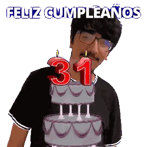 a man is holding a birthday cake with a number 31 on it