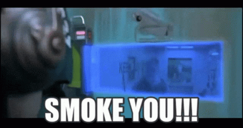 A Man Is Holding A Blue Box That Says " Smoke You " GIF