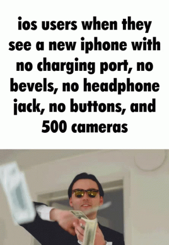 A Man Is Holding A Bunch Of Money In Front Of A Sign That Says Ios Users When They See A New Iphone With GIF