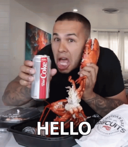 A Man Is Holding A Can Of Diet Coke And A Lobster GIF