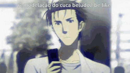 A Man Is Holding A Cell Phone In His Hand While Looking At It . GIF