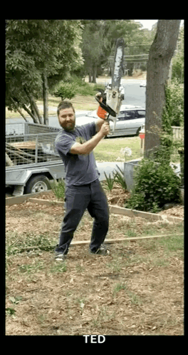 A Man Is Holding A Chainsaw In A Yard And The Name Ted Is On The Bottom GIF