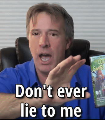 A Man Is Holding A Dvd That Says Cool Saves GIF