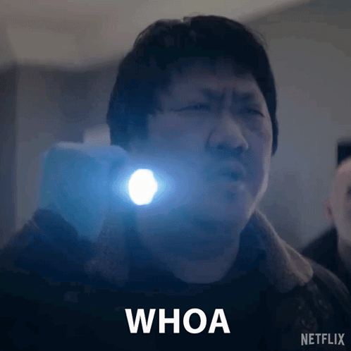 Man Holding Flashlight Saying Whoa GIF