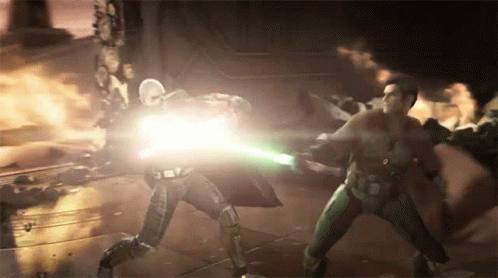 A Man Is Holding A Green Lightsaber While Fighting Another Man In A Video Game GIF
