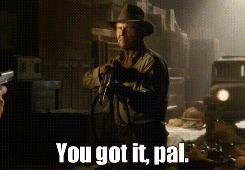 A Man Is Holding A Gun And Says You Got It Pal GIF