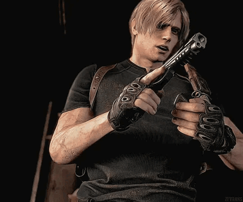 A Man Is Holding A Gun In His Hand In A Dark Room . GIF