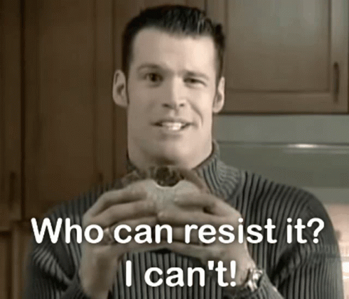 A Man Is Holding A Hamburger And Says Who Can Resist It I Can 'T ! GIF