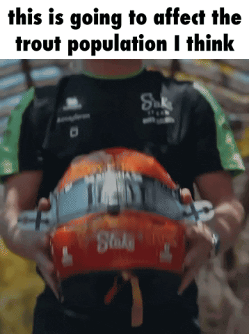 A Man Is Holding A Helmet With The Words This Is Going To Affect The Trout Population I Think On It GIF