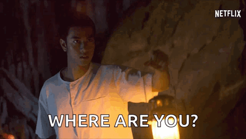 A Man Is Holding A Lantern And Asking Where Are You ? GIF