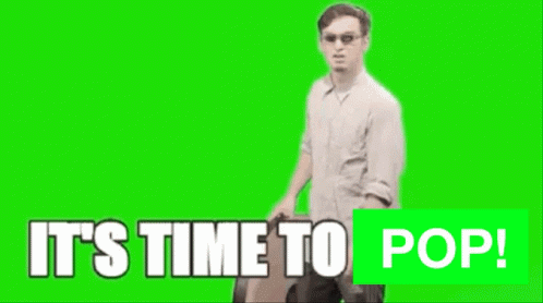 a man is holding a large clock with the words it 's time to pop