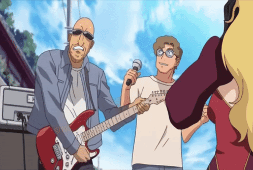 A Man Is Holding A Microphone And Playing A Guitar GIF