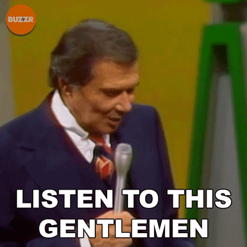 A Man Is Holding A Microphone And Says Listen To This Gentlemen GIF