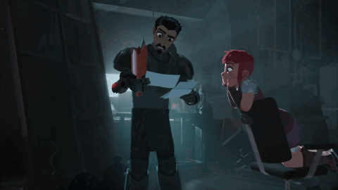 A Man Is Holding A Piece Of Paper In Front Of A Woman GIF