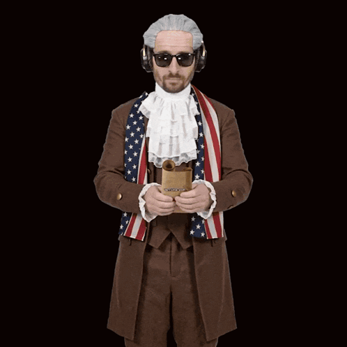 A Man Is Holding A Piece Of Paper With The Word Constitution On It GIF