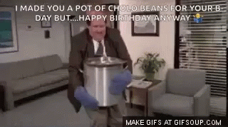 A Man Is Holding A Pot Of Cholo Beans In His Hands . GIF