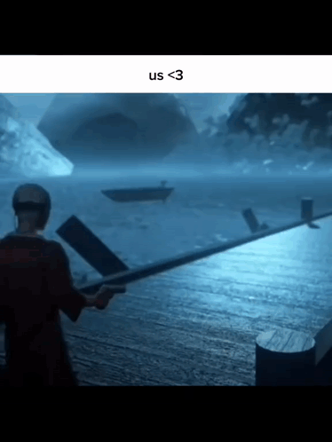 A Man Is Holding A Sword In Front Of A Body Of Water With A Boat In The Distance . GIF