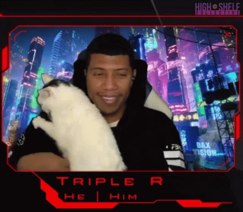 A Man Is Holding A White Cat In Front Of A Screen That Says Triple R On It GIF