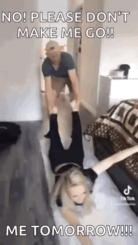 a man is holding a woman upside down on a bed and says `` no ! please don 't make me go ! ''