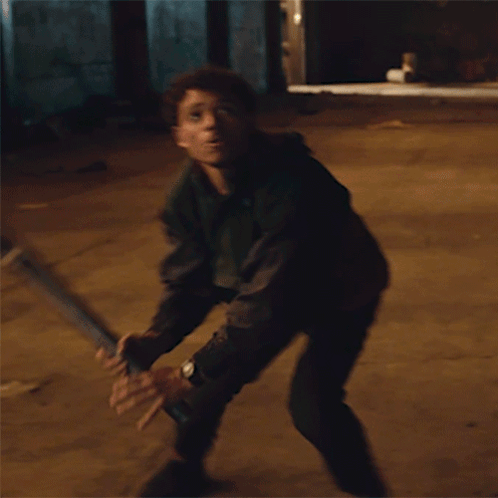 Man Holding Wooden Stick Back Up GIF