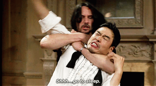 A Man Is Holding Another Man 'S Neck And Says Shhh Go To Sleep GIF