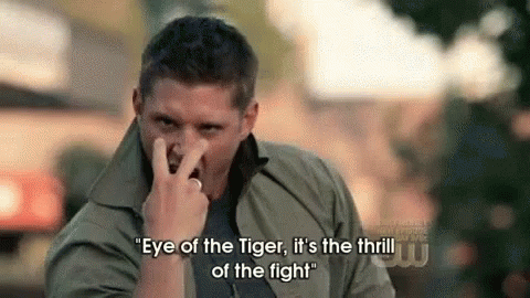 A Man Is Holding His Nose And Saying `` Eye Of The Tiger , It 'S The Thrill Of The Fight '' GIF