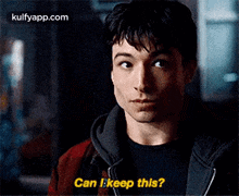 A Man Is Holding Something In His Hand And Asking Can I Keep This . GIF