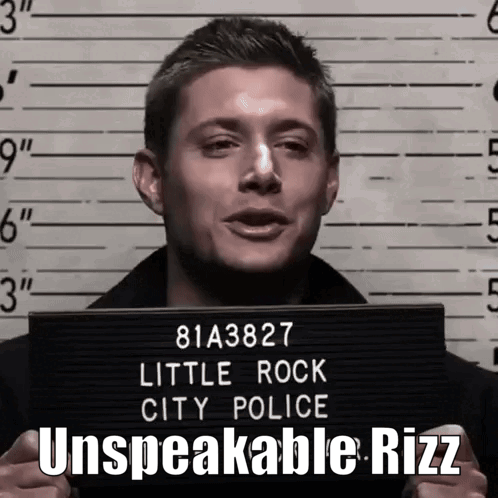 A Man Is Holding Up A Little Rock City Police Mugshot GIF