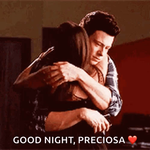 A Man Is Hugging A Woman With The Words " Good Night Preciosa " Written On The Bottom GIF