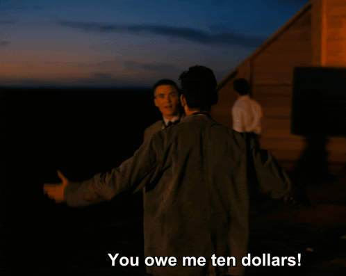 A Man Is Hugging Another Man With The Words You Owe Me Ten Dollars Below Him GIF