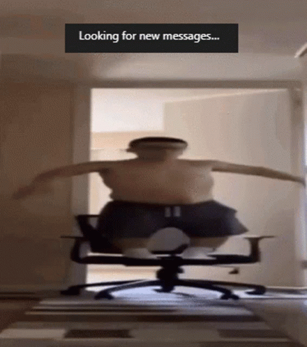 A Man Is Jumping In A Chair With The Words Looking For New Messages Written Above Him GIF