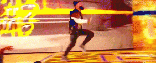 a man is jumping in the air while holding a basketball .