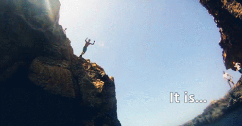 A Man Is Jumping Off A Cliff With The Words It Is Written Below Him GIF