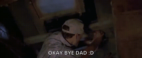 A Man Is Kneeling Down In A Dark Room With The Words Okay Bye Dad GIF