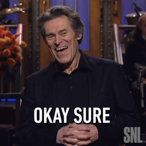A Man Is Laughing And Says Okay Sure On Snl GIF