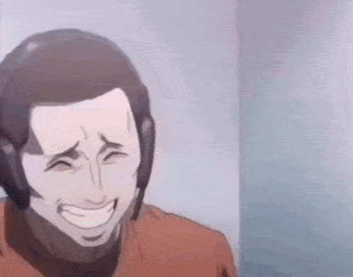 A Man Is Laughing While Wearing A Helmet And A Red Shirt . GIF