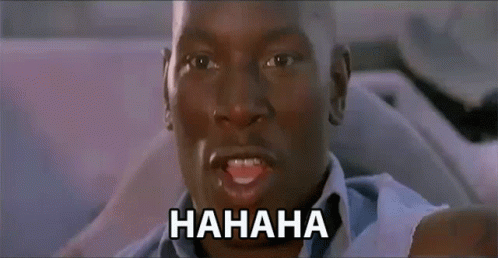 A Man Is Laughing With The Word Hahaha On The Bottom Right GIF