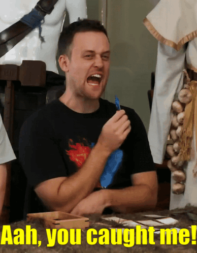A Man Is Laughing With The Words " Aah You Caught Me " Behind Him GIF